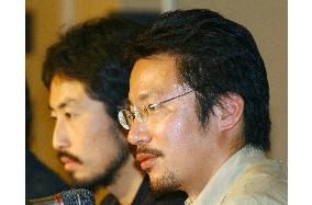 2 freed Japanese say Iraq ordeal different from 3 hostages