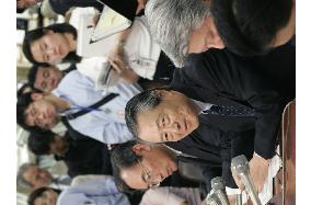 Mitsubishi Tokyo Financial returns to black in FY 2003