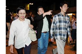 Bodies of 2 slain Japanese journalists arrive in Bangkok