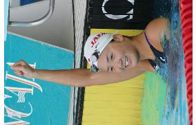 Nakamura wins 100-meter backstroke
