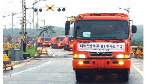 (2)S. Korea delivers rice to N. Korea overland for 1st time