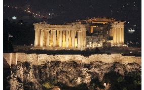 (1)Torch in Athens, Lewis carries flame toward Acropolis