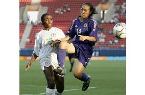 (1)Japan's women soccer team into quarterfinals, despite loss