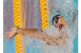 Morita powers into 100 backstroke semis