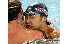 (3)Kitajima wins gold in 100m breaststroke