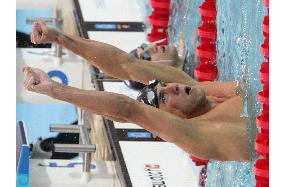 (1)Phelps wins men's 100m butterfly in Olympics