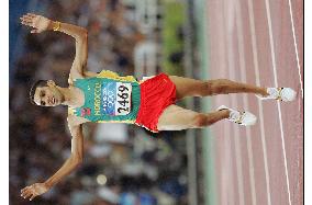 (1)Morocco's El Guerrouj wins gold in men's 5,000 meters