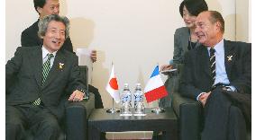 Koizumi meets with Chirac in Hanoi