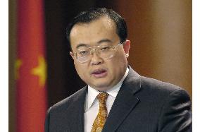 (1)China demands Japan cancel visa for Taiwan's Lee