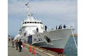 Japan unveils new patrol boat to seize suspicious ships