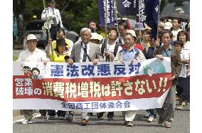 May Day protesters urge halt to proposed constitutional revision
