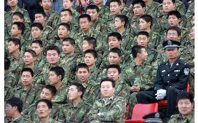 (3) China police on high alert at Japan-China soccer match