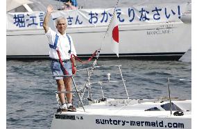 Horie completes 2nd solo sailing trip around globe