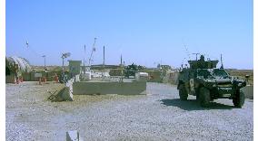 Japanese SDF vehicles leave Samawah base for 1st time since blast