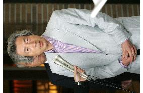 Koizumi leaves for G-8 summit in Scotland