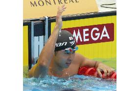 Kitajima rewrites national mark in 50 breaststroke semi