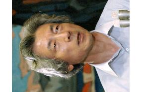 Koizumi warns LDP members against opposing postal bills