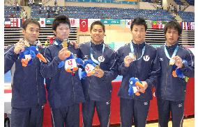 Japan strikes gold in swimming, gymnastics