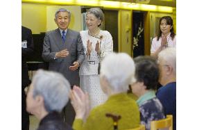 Emperor, empress visit nursing home in Tokyo