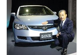 Honda rolls out new Civic, hybrid version due in November