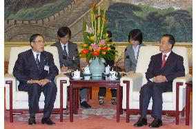 Japanese business leader meets with Chinese premier
