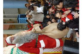 Santa Claus comes to Japan from Santa Claus' Village in Finland