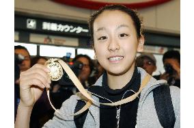 Figure skater Asada returns to Japan