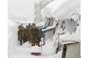 Heavy snowfall in Japan leads to relief efforts by ground troops