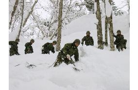 GSDF removes snow along national road in Niigata Pref.