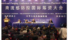 Donors at Beijing bird flu funding conference pledge $1.9 bil.
