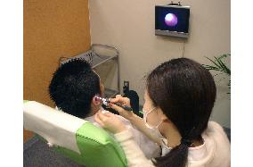 Healing services parlors emerge, specialize in ear cleaning