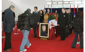 Milosevic coffin goes on public view in Belgrade.