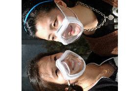 Transparent masks put on sale for protection from yellow sand