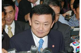 Thai premier Thaksin rebuffs resignation call after election