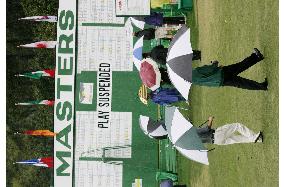 Masters temporarily suspended due to bad weather