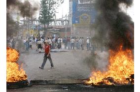 Residents burn tires to block roads in Kathmandu