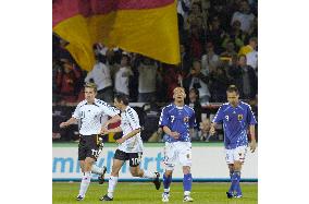 Japan hold World Cup hosts Germany to 2-2 draw