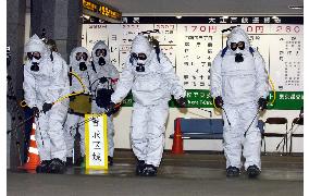 Tokyo police hold chemical attack drill in subway station