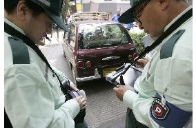 Private sector starts handling parking violations