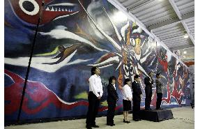 Artist Okamoto's restored A-bomb mural shown to press