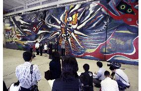 Artist Okamoto's restored A-bomb mural shown to press