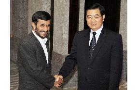 Iranian Pres. Ahmadinejad meets with China's Hu