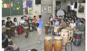 Drumming in a circle helps emotionally distressed kids