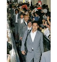 Japan's national squad return from World Cup soccer in Germany