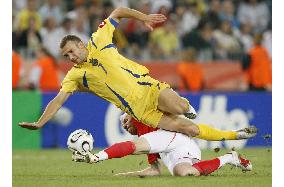 Ukraine beat Switzerland in shootout to reach quarterfinals