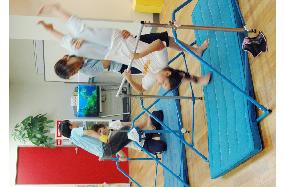 Home tutors active in assisting children in physical education