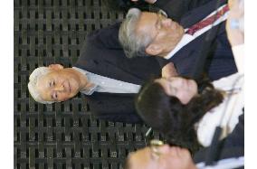 BOJ chief upbeat on economic outlook, mum on rate hike
