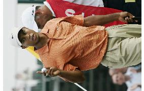Woods leads British Open