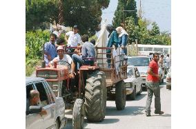 People evacuating southern Lebanon