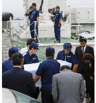 Fisherman's body returns to Japan